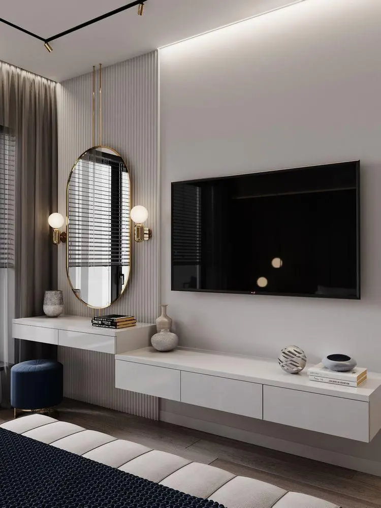 Quarto com painel de TV, penteadeira suspensa e espelho oval